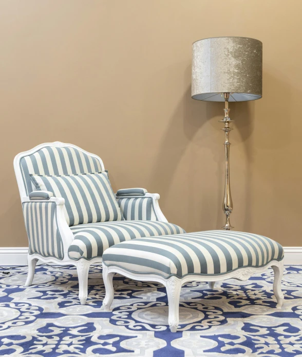 a blue and white striped chair and ottoman, inspired by Emilio Grau Sala, rococo, 15081959 21121991 01012000 4k, grey, islamic, high quality product photo