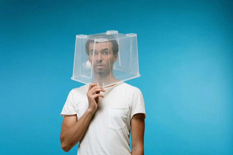 a man with a clear plastic box on his head, unsplash, conceptual art, square jaw, various posed, kek, gauze