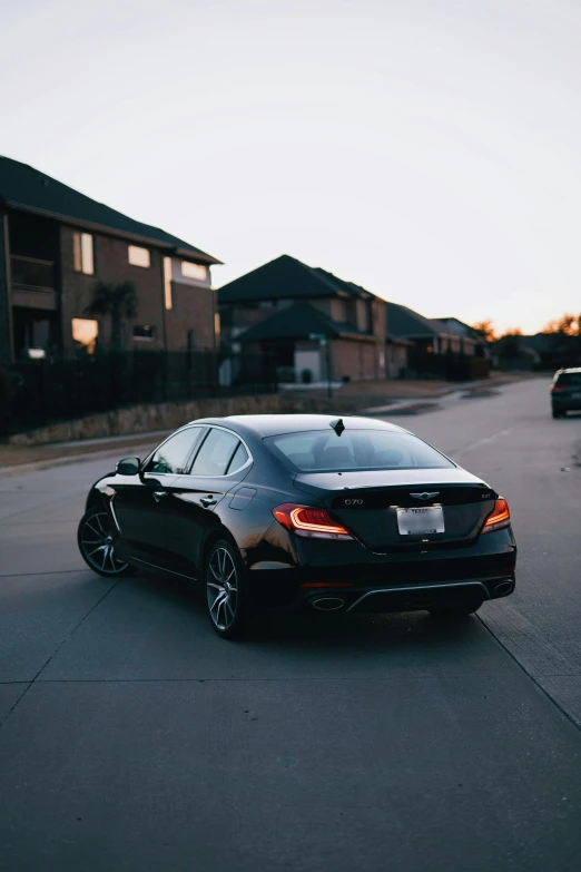 a black car parked on the side of a road, a picture, tail lights, at home, 2019 trending photo, profile picture