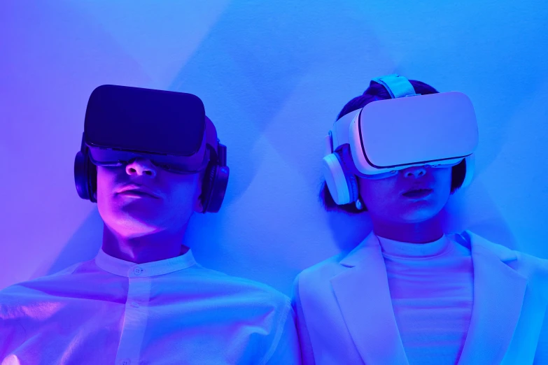 two people wearing virtual reality headsets, by Carey Morris, trending on unsplash, hypermodernism, bright blue future, sleepy, trending on mentalray, led gaming