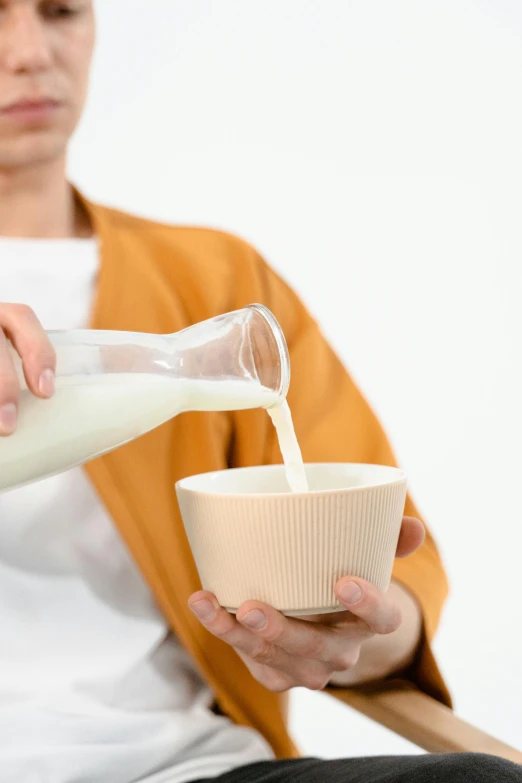 a woman is pouring milk into a bowl, by Katsukawa Shun'ei, unsplash, mingei, square, high quality topical render, show, without background