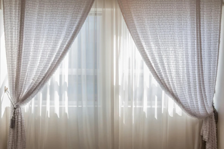 a bed sitting in a bedroom next to a window, unsplash, ethereal curtain, plastic and fabric, silver，ivory, curtain