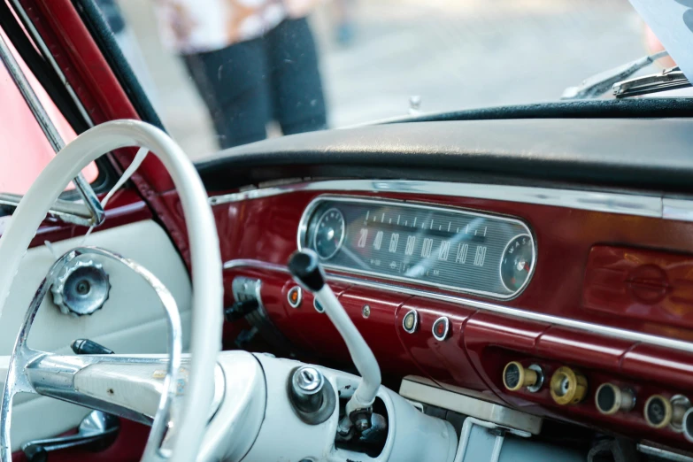 a close up of a steering wheel and dashboard of a car, by Tom Bonson, trending on unsplash, retrofuturism, square, standing in front of lowrider, silver red white details, 15081959 21121991 01012000 4k