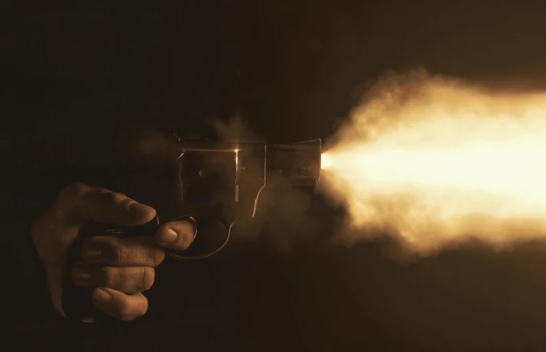 a person holding a gun with smoke coming out of it, pexels contest winner, dramatic lighting render, background image, first person weapon, instagram photo