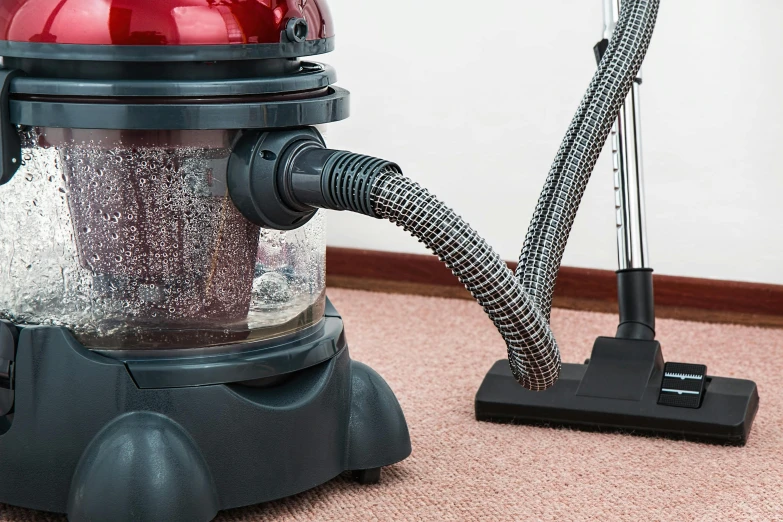 a vacuum that is sitting on the floor, by Adam Marczyński, pixabay, plasticien, australian, 15081959 21121991 01012000 4k