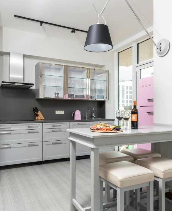 the kitchen is clean and ready for us to use, by Adam Marczyński, unsplash, light and space, magenta and gray, lgbtq, airbnb, square