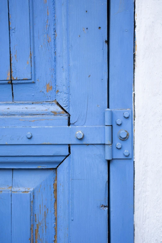 a close up of a blue door on a building, inspired by Jan Kupecký, unsplash, square, rugged details, white and blue, solid colors