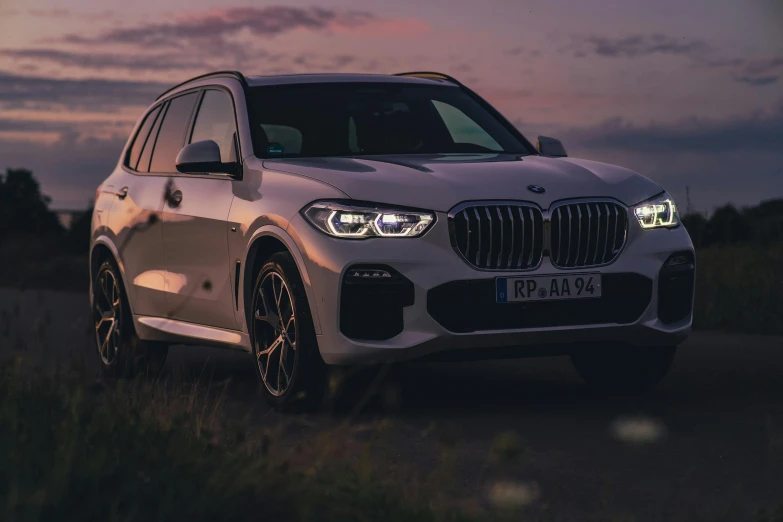 a white bmw suv parked on the side of a road, by Adam Marczyński, pexels contest winner, romanticism, 8k hdr dusk light, front lit, profile image, dramatic lighting - n 9