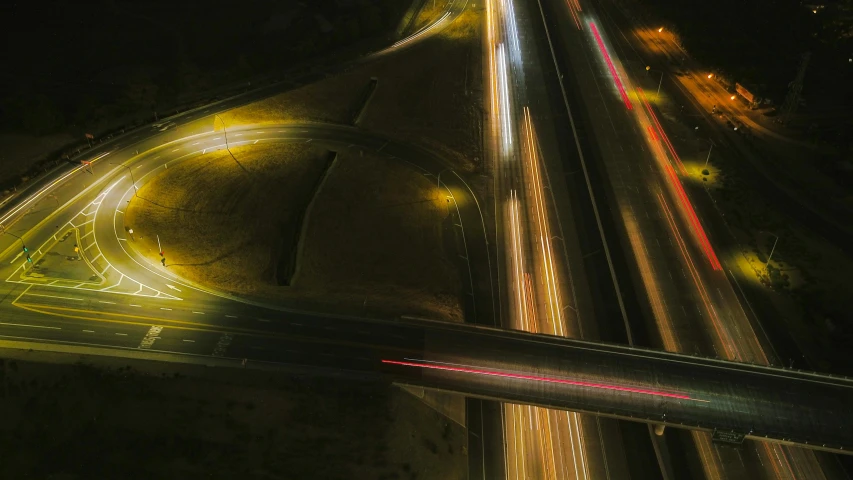 an aerial view of a highway at night, pexels contest winner, photorealist, light shafts, ilustration, snapchat photo