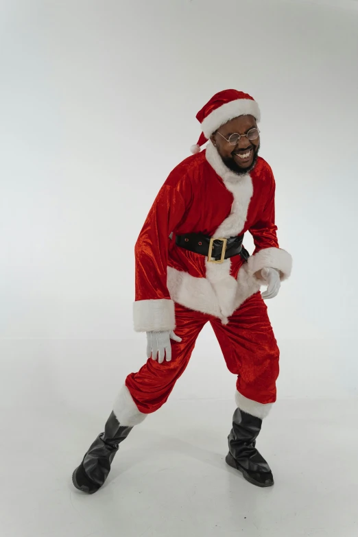 a man in a santa suit posing for a picture, an album cover, jemal shabazz, high resolution image, he is dancing, - n 9