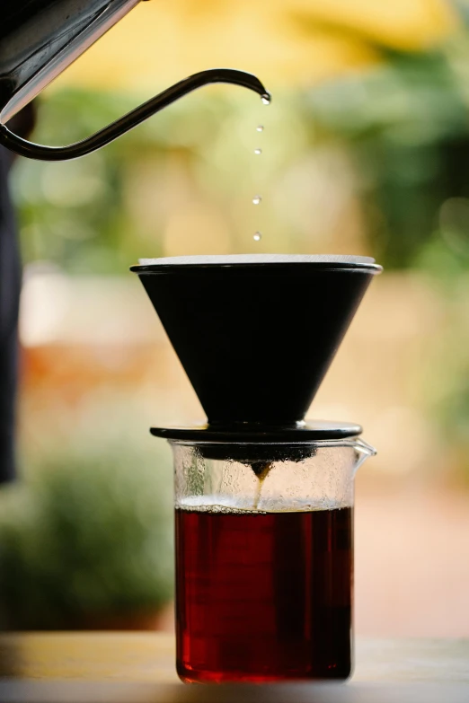 a pour pour pour pour pour pour pour pour pour pour pour pour pour pour pour pour pour pour pour pour pour pour pour pour pour pour pour, a digital rendering, by Julia Pishtar, unsplash, cold brew coffee ), close-up shot taken from behind, cone shaped, outside