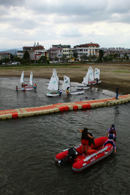 a group of people on small boats in a body of water, inspired by Yasar Vurdem, happening, bored ape yacht club, georgic, training, square