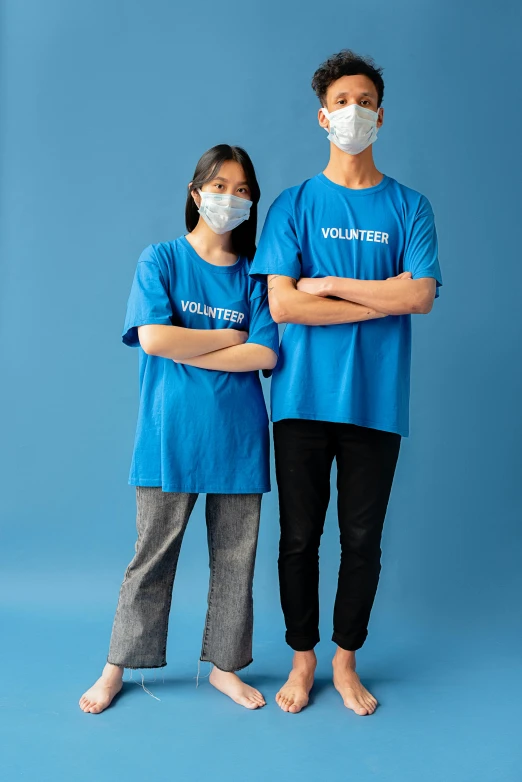 a man and a woman wearing face masks, pexels contest winner, blue tight tshirt, fullbody or portrait, thumbnail, academic clothing
