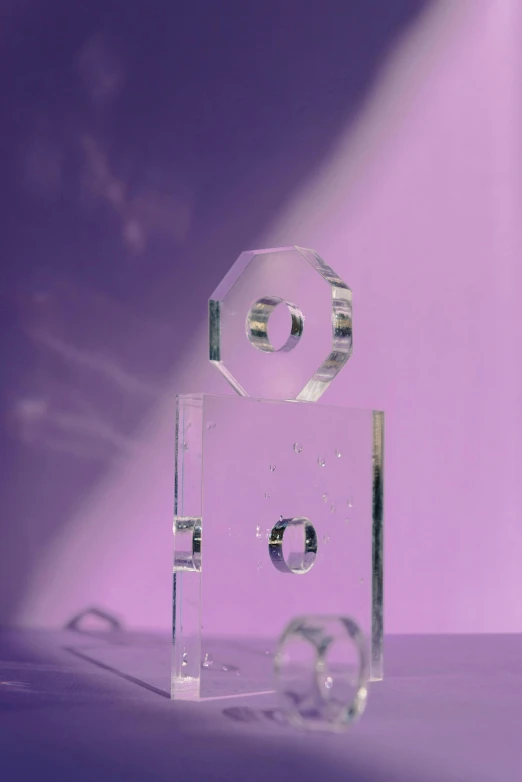 a crystal robot sitting on top of a table, an abstract sculpture, trending on pexels, multiple purple halos, abstract mirrors, transparent, soft aesthetic