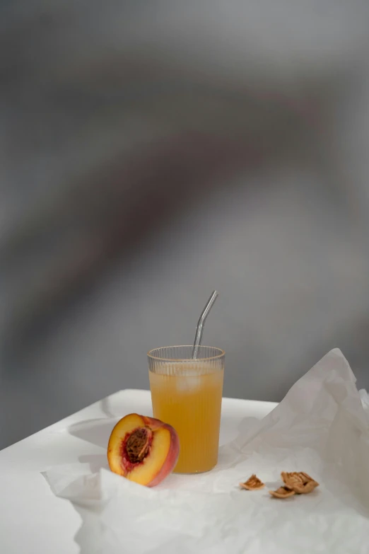 a glass of orange juice sitting on top of a table, inspired by Jacopo Bellini, photorealism, peaches, todd hido, circa 1982, summer street