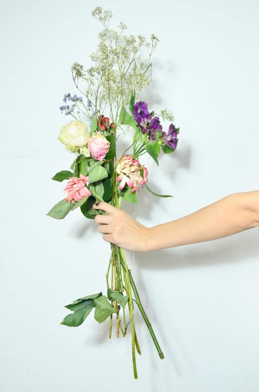 a woman is holding a bunch of flowers, a still life, inspired by François Boquet, unsplash, on clear background, made of flowers, of letting go, pose 4 of 1 6