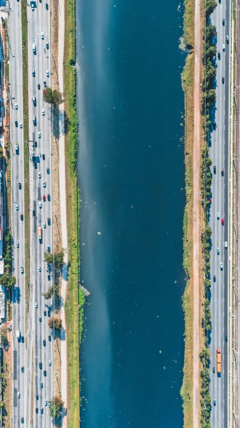 an aerial view of a highway next to a body of water, renaissance, los angelos, datapipeline or river, best photo, thumbnail