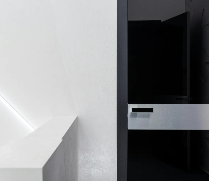 a white bath tub sitting in a bathroom next to a sink, inspired by Bauhaus, unsplash contest winner, minimalism, dark hallway, exiting from a wardrobe, neo kyiv, close up shot from the side