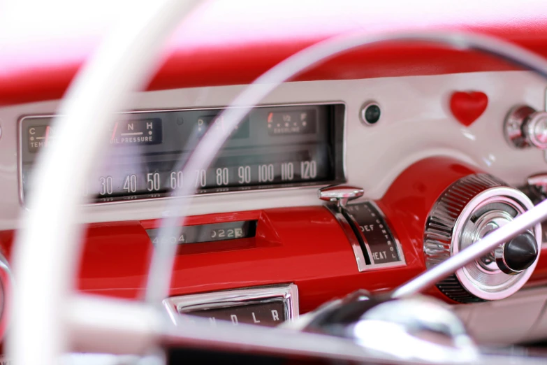 a close up of a red and white car dashboard, an album cover, 15081959 21121991 01012000 4k, radios, in retro colors, peaks