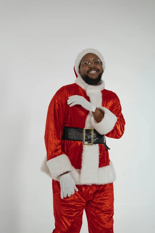 a man in a santa suit posing for a picture, an album cover, pexels, jaylen brown, lgbtq, twitch streamer, leaked photo