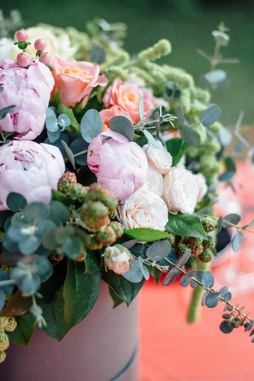 a vase filled with pink and white flowers, vibrant greenery, peony, closeup, toned orange and pastel pink