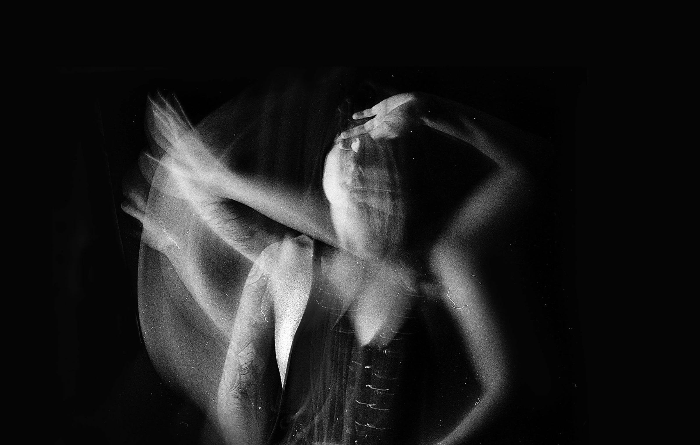 a black and white photo of a woman in a corset, by Caroline Mytinger, art photography, lightpainting motion blur, full of glass. cgsociety, studio medium format photograph, gesture