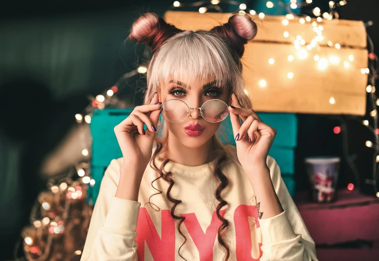 a woman holding a magnifying glass in front of her face, an album cover, inspired by Elsa Bleda, trending on pexels, maximalism, two pigtails hairstyle, silver hair girl, lots of lights, square rimmed glasses