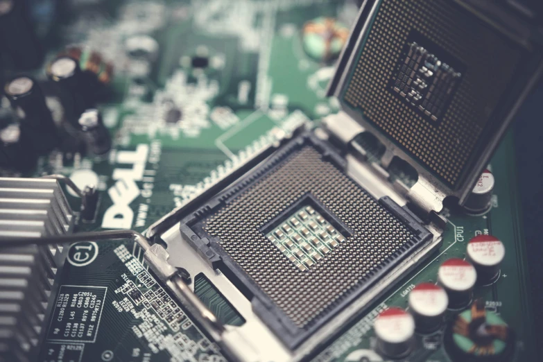 a close up of a computer mother board, a computer rendering, by Jason Felix, unsplash, fan favorite, cpu gpu wafer, instagram picture, vintage inspired