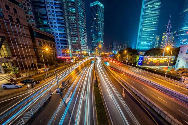 a city street filled with lots of traffic next to tall buildings, pexels contest winner, orange and cyan lighting, highways, shanghai, charging through city