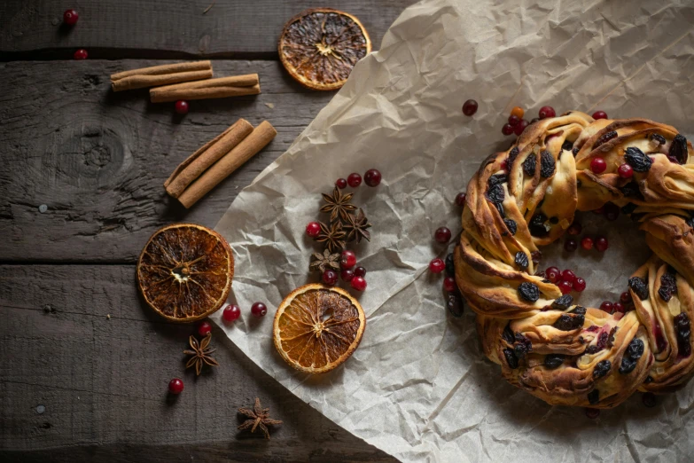 a pastry sitting on top of a piece of paper, a still life, trending on pexels, festive, rondel, cinamtic, thumbnail