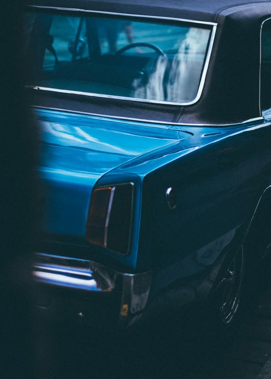 a blue car parked on the side of the road, pexels contest winner, hypermodernism, half rear lighting, square, lowriders, profile image