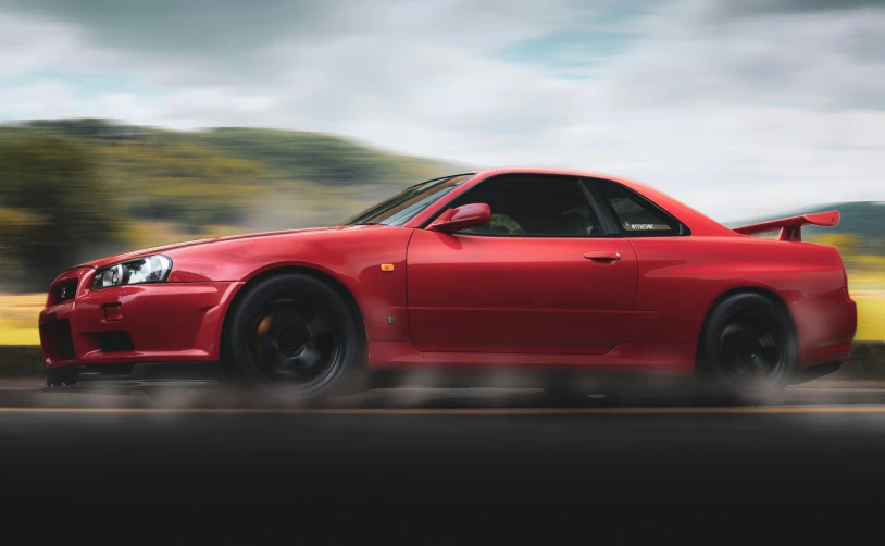 a red sports car driving down a road, a portrait, pexels contest winner, in a modified nissan skyline r34, octane engine render, side profile shot, exhilarated