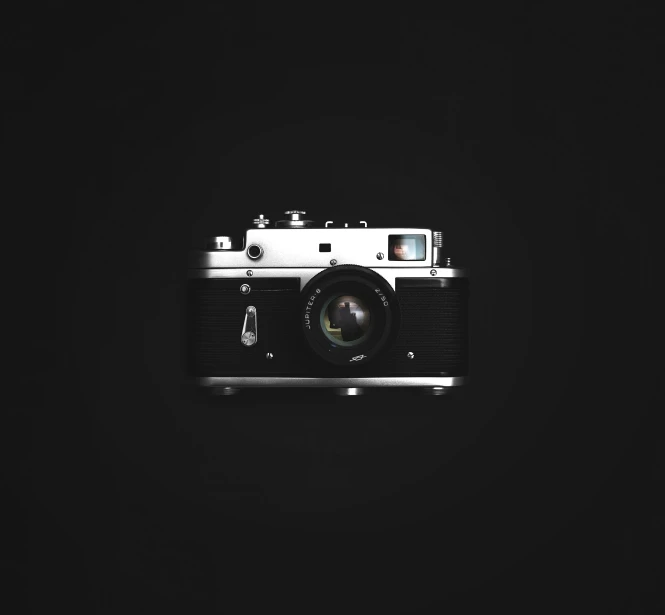 a black and white photo of a camera, unsplash contest winner, art photography, on a flat color black background, leica iii, 2 4 0 p footage, medium format