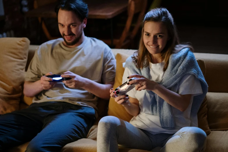 a man and a woman sitting on a couch playing video games, promotional image, instagram picture, indoor picture, profile picture 1024px