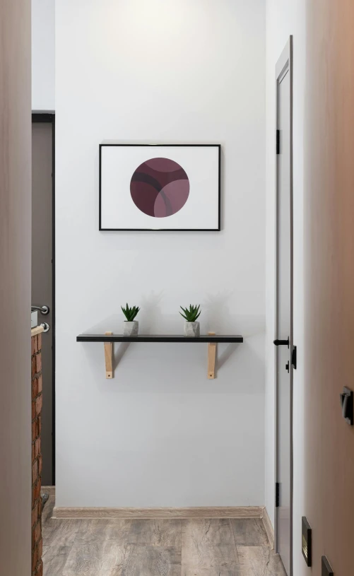 a hallway with a shelf and a painting on the wall, inspired by Reinier Nooms, unsplash, conceptual art, flat 2 d design, dwell, furnished room, small