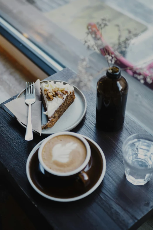 a cup of coffee and a piece of cake on a table, by Jan Tengnagel, trending on unsplash, renaissance, thumbnail, iced latte, healthy, cafe interior