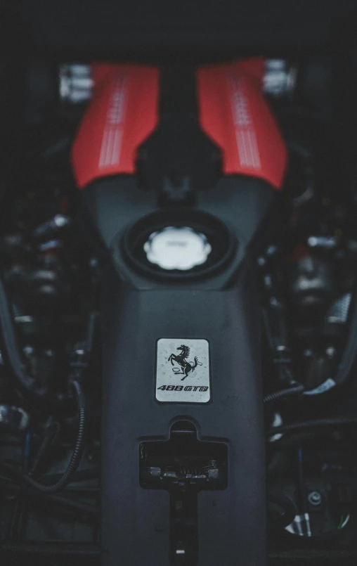 a close up of the engine of a motorcycle, by Austin English, pexels contest winner, renaissance, ferrari 458, modern minimalist f 2 0, icon, tesla logo on chest