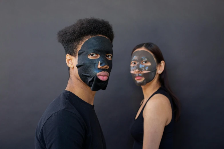 a man and a woman wearing face masks, by Julia Pishtar, jet - black skin, defined face, korean, sticky black goo