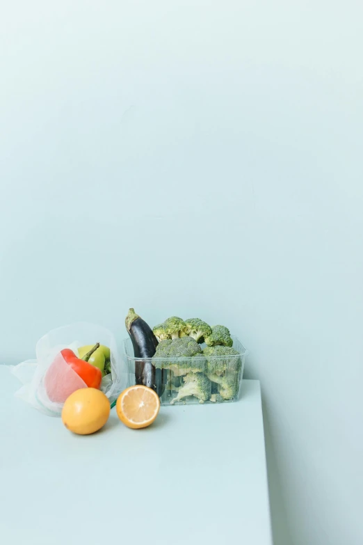 a white table topped with fruit and vegetables, a still life, pexels, made of plastic, on clear background, square, yes