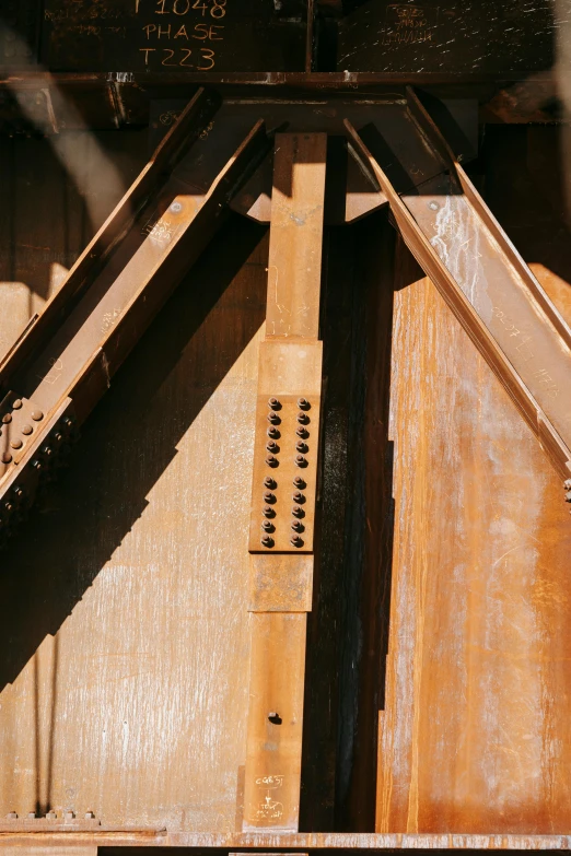 a close up of a train on a track, wooden structures, steel studs, copper, 8k detail