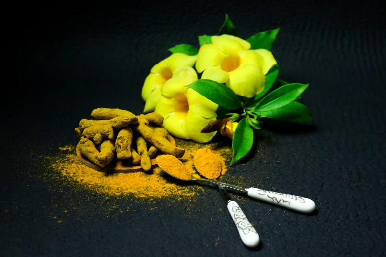 a couple of spoons sitting next to a pile of food, yellow flowers, skin care, assamese aesthetic, thumbnail