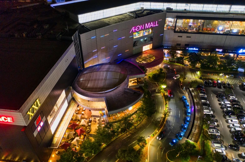 an aerial view of a shopping mall at night, a portrait, by Adam Manyoki, pexels contest winner, manila, avatar image, mall background, wide angle establishing shot