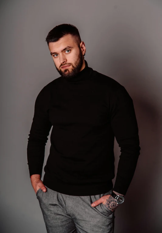 a man standing with his hands in his pockets, a character portrait, inspired by Alexey Merinov, pexels contest winner, hurufiyya, black turtleneck, bodybuilder ernest khalimov, headshot profile picture, square