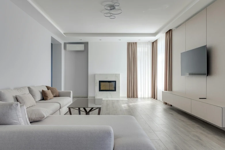 a living room filled with furniture and a flat screen tv, pexels contest winner, light and space, minimalist interior design, silver，ivory, royal interior, neutral colours