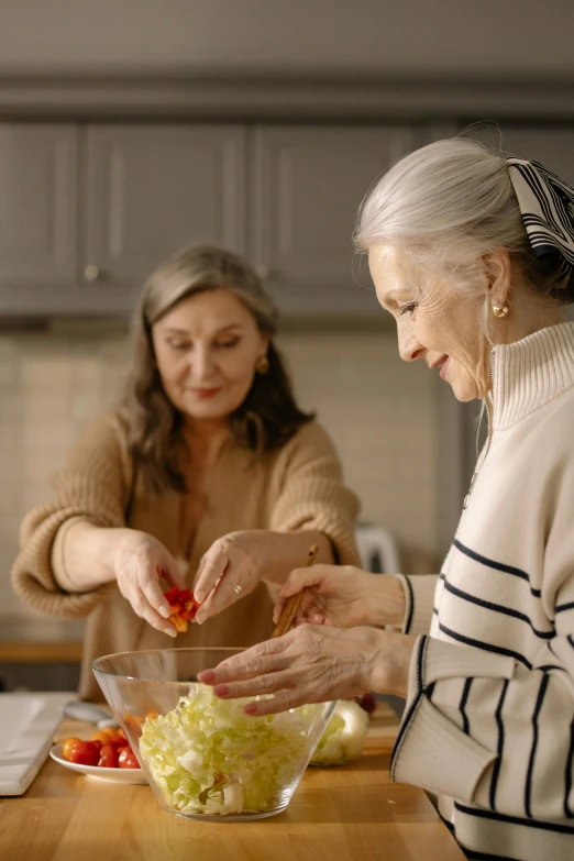 two women in a kitchen preparing food together, trending on pexels, renaissance, gray haired, square, gold, transparent