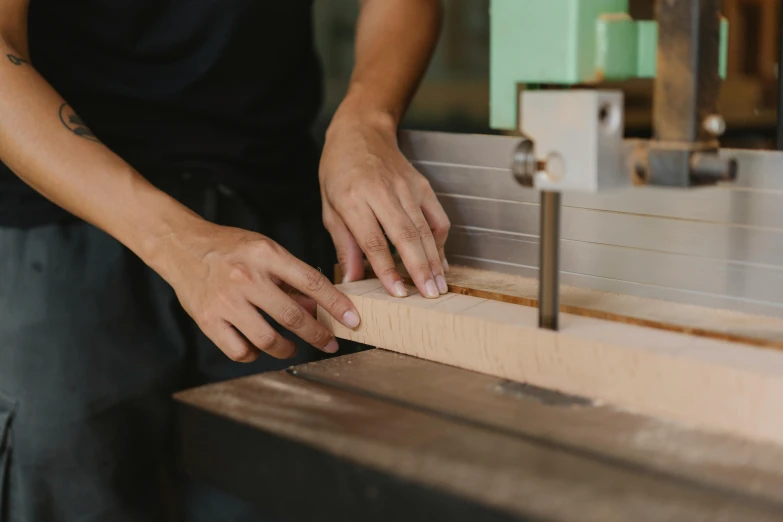 a person cutting a piece of wood with a band saw, trending on pexels, arts and crafts movement, indi creates, thumbnail, french provincial furniture, high quality product image”