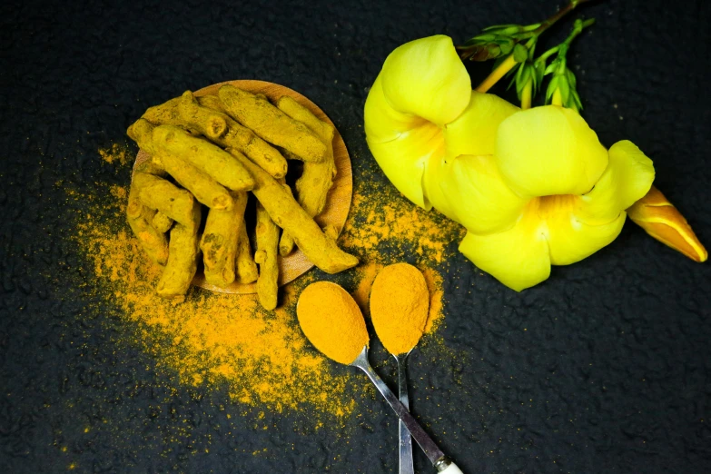 a bowl of turmet next to a pair of scissors, by Julia Pishtar, trending on unsplash, hurufiyya, yellow flowers, spices, 15081959 21121991 01012000 4k, india