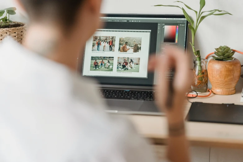 a man sitting in front of a laptop computer, a picture, trending on pexels, use rule of thirds, close up to the screen, photoshop collage, digital asset