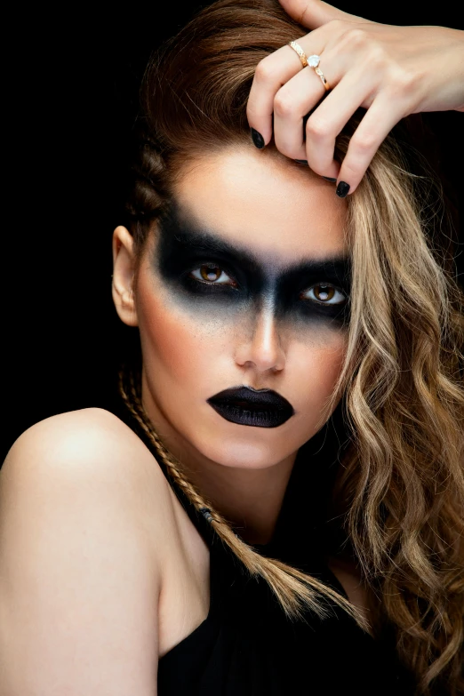 a woman with black makeup and a black dress, inspired by Emma Andijewska, trending on pexels, square, charcoal and champagne, vivid), fierce expression 4k