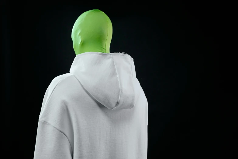 a mannequin wearing a white hoodie against a black background, trending on pexels, hyperrealism, lime green, rear-shot, gray alien, anorld render